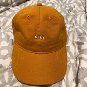 Obey hat in apricot orange
